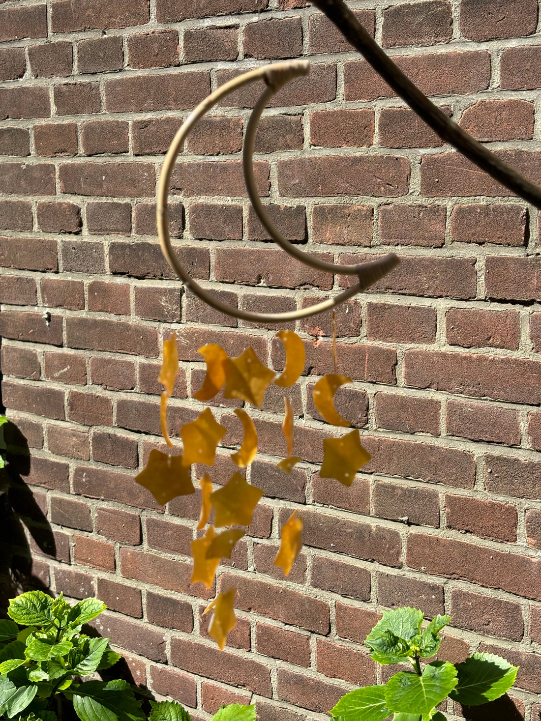 Maanhanger met schelpen